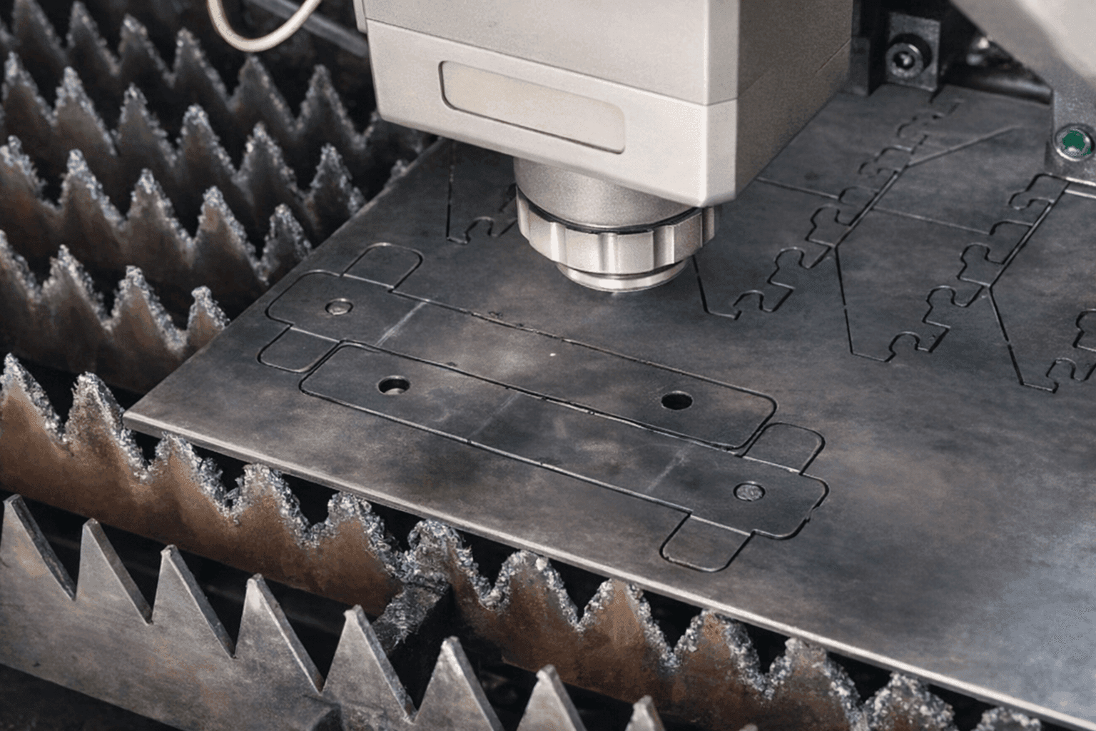 Sample flat metal part after laser cutting